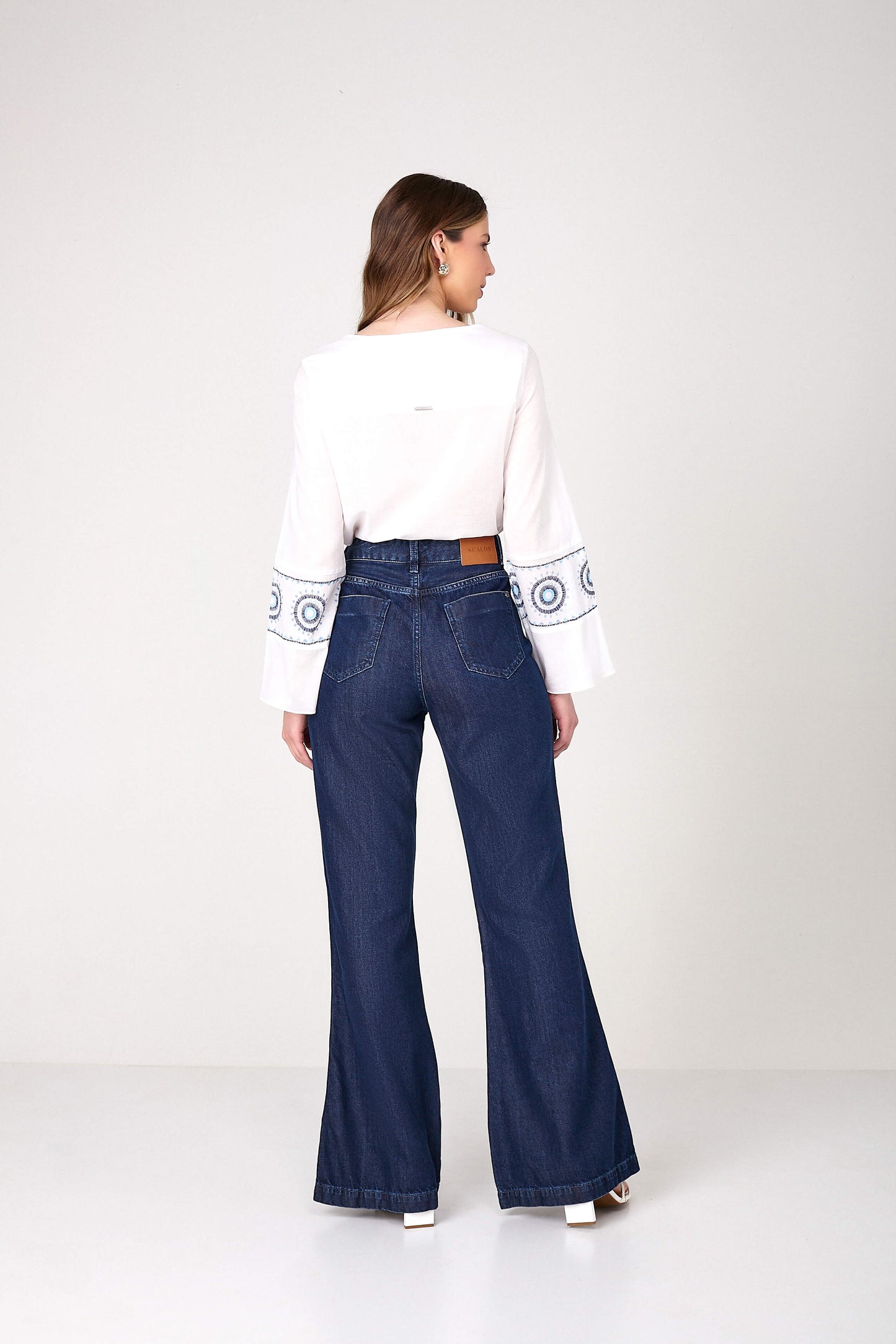 calça jeans lounge flare cintura alta