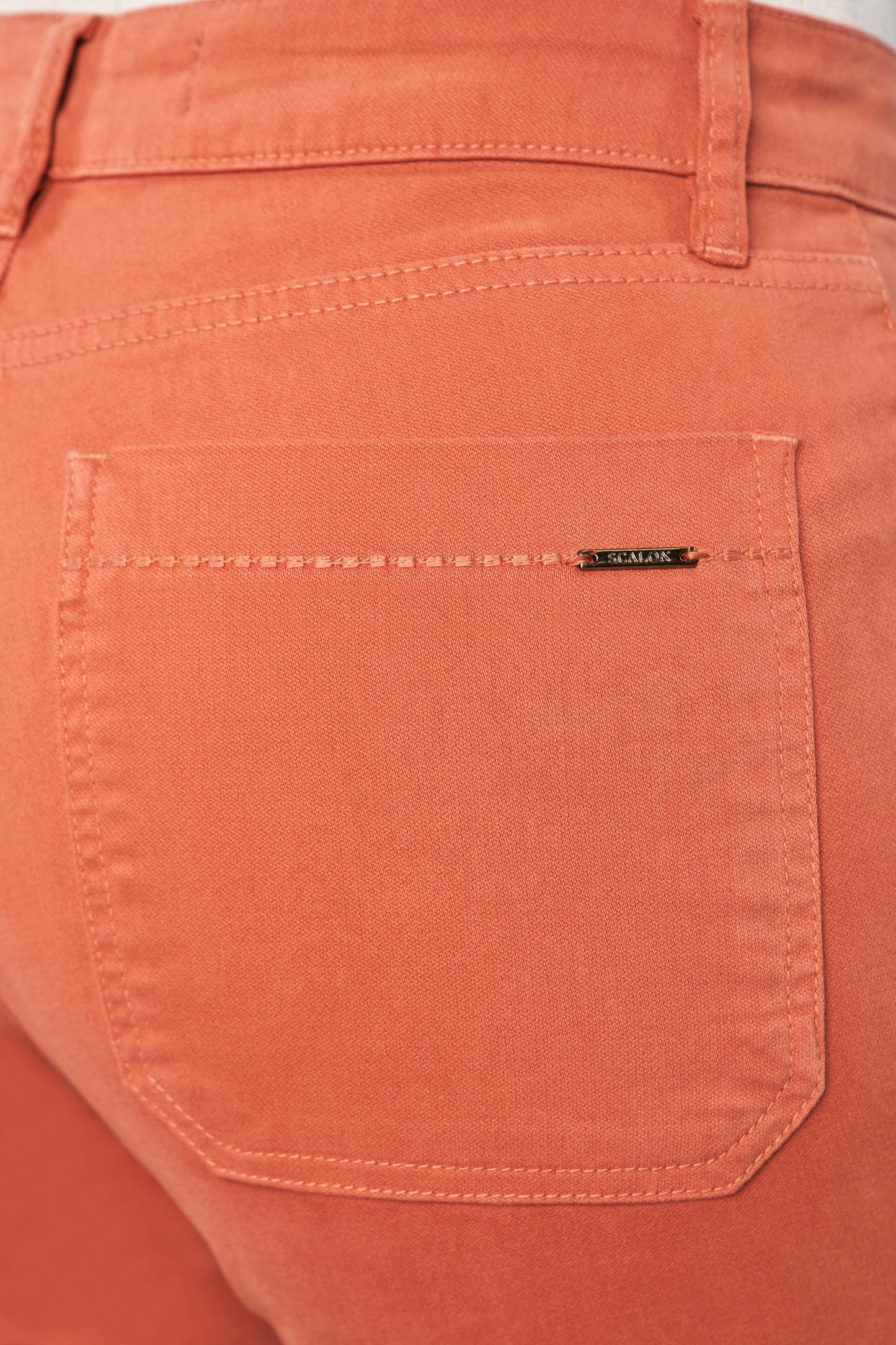 calça malha color reta cintura intermediária com bordados