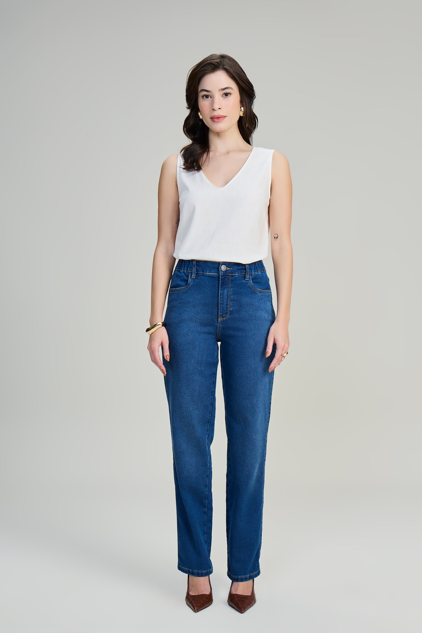calça jeans malha reta cintura intermediária com elástico