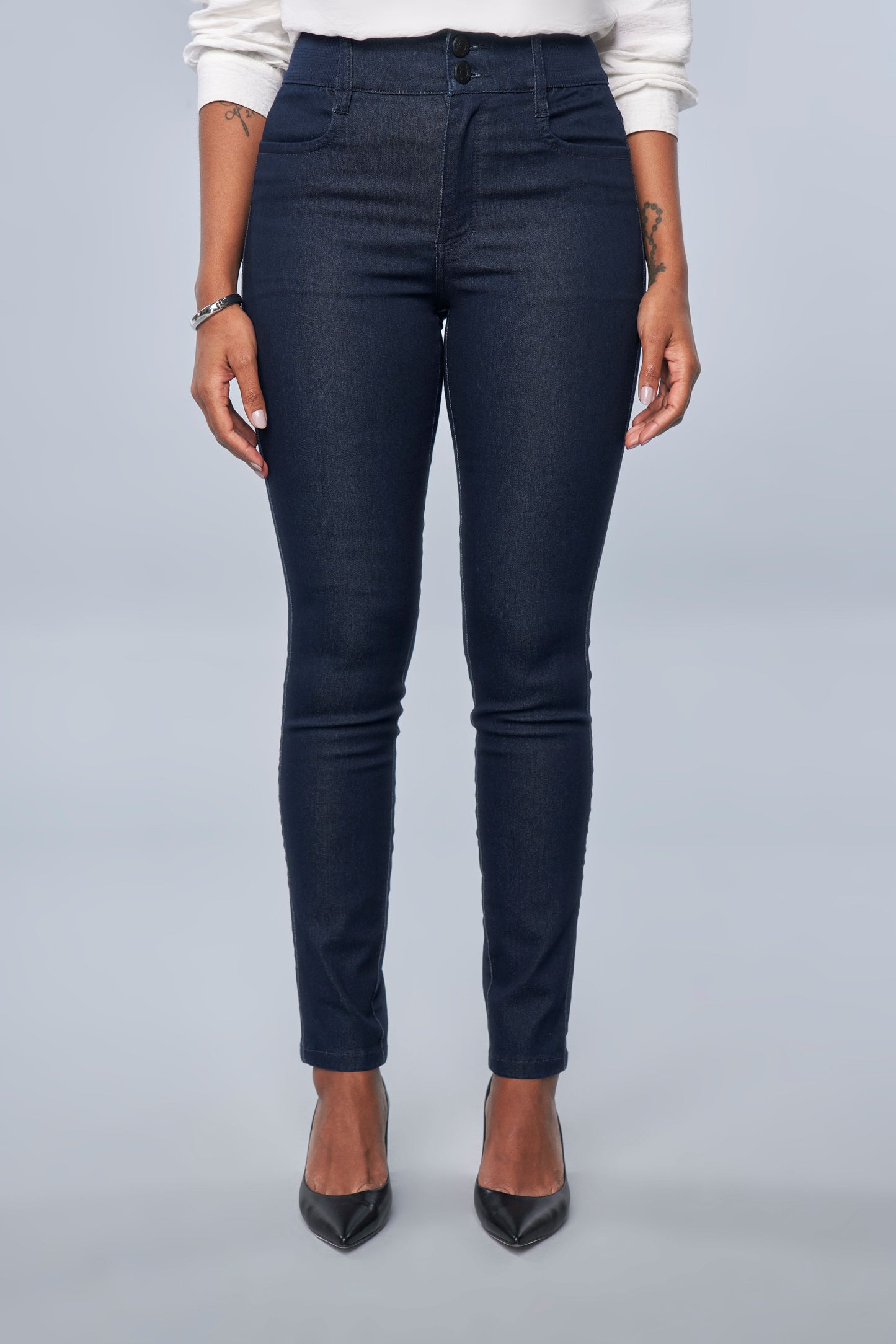calça jeans skinny cintura intermediária cós de tricot