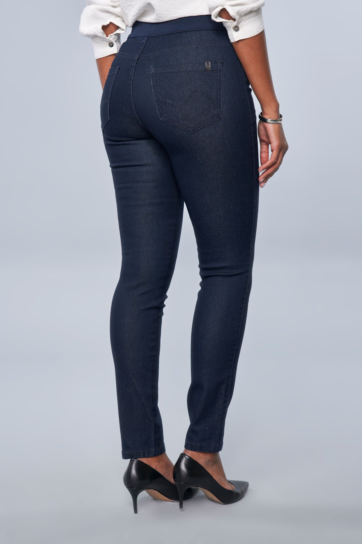 calça jeans skinny cintura intermediária cós de tricot