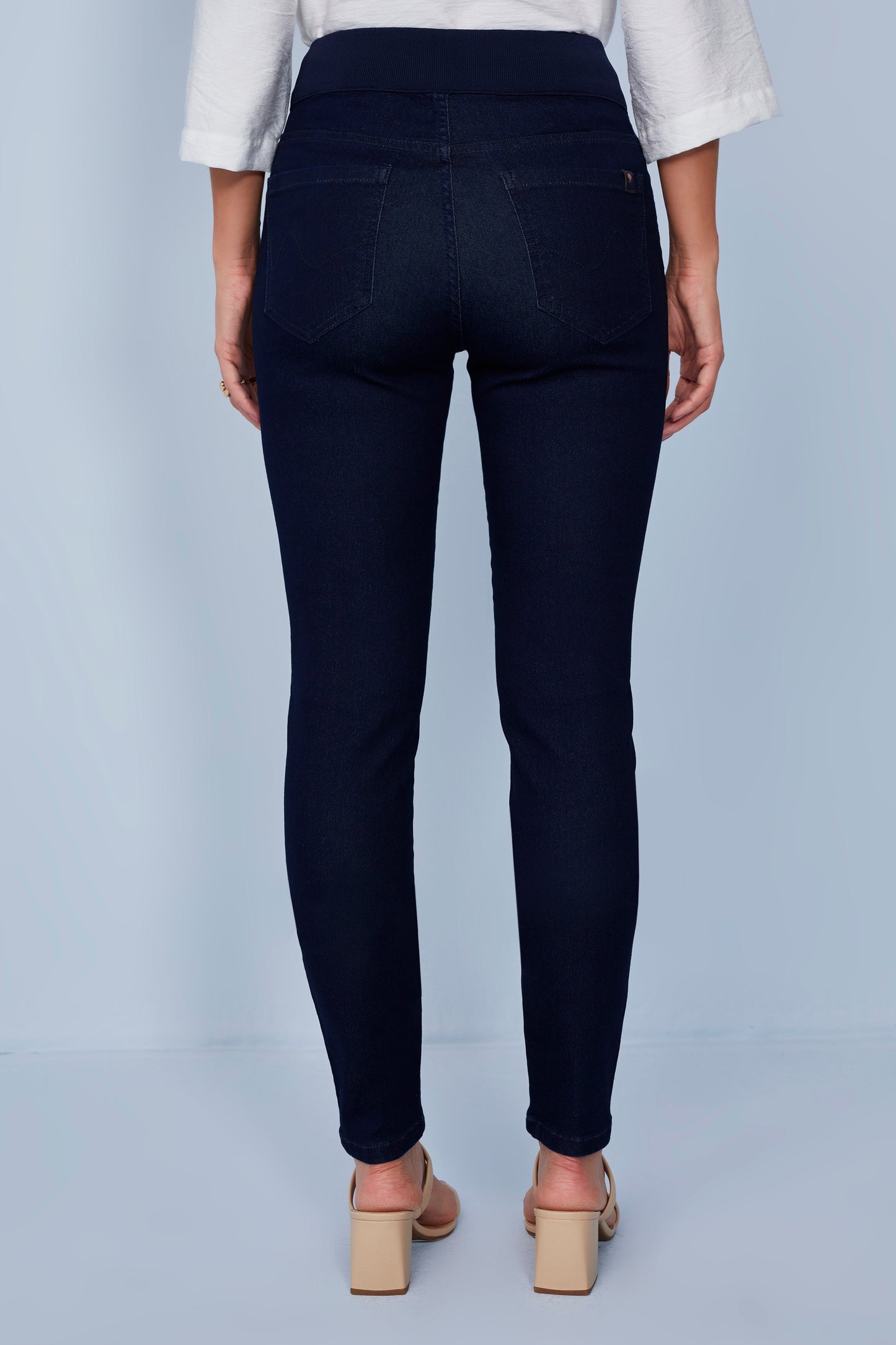 calça jeans skinny cintura intermediária cós de tricot
