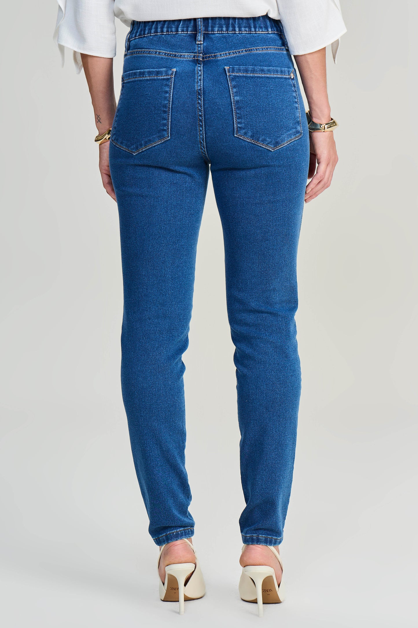 calça jeans malha skinny cintura intermediária com elástico