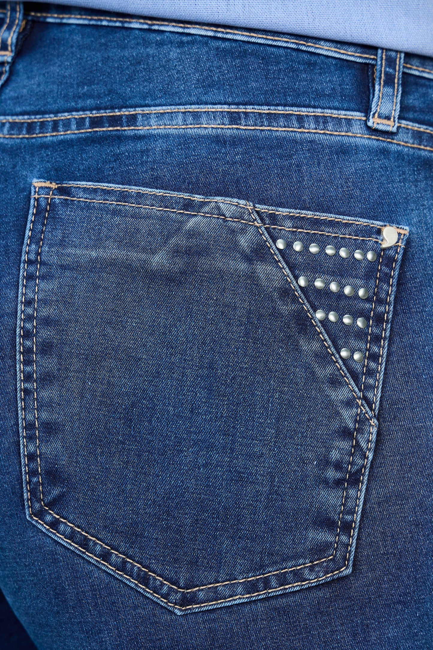 calça jeans skinny cintura intermediária com metais