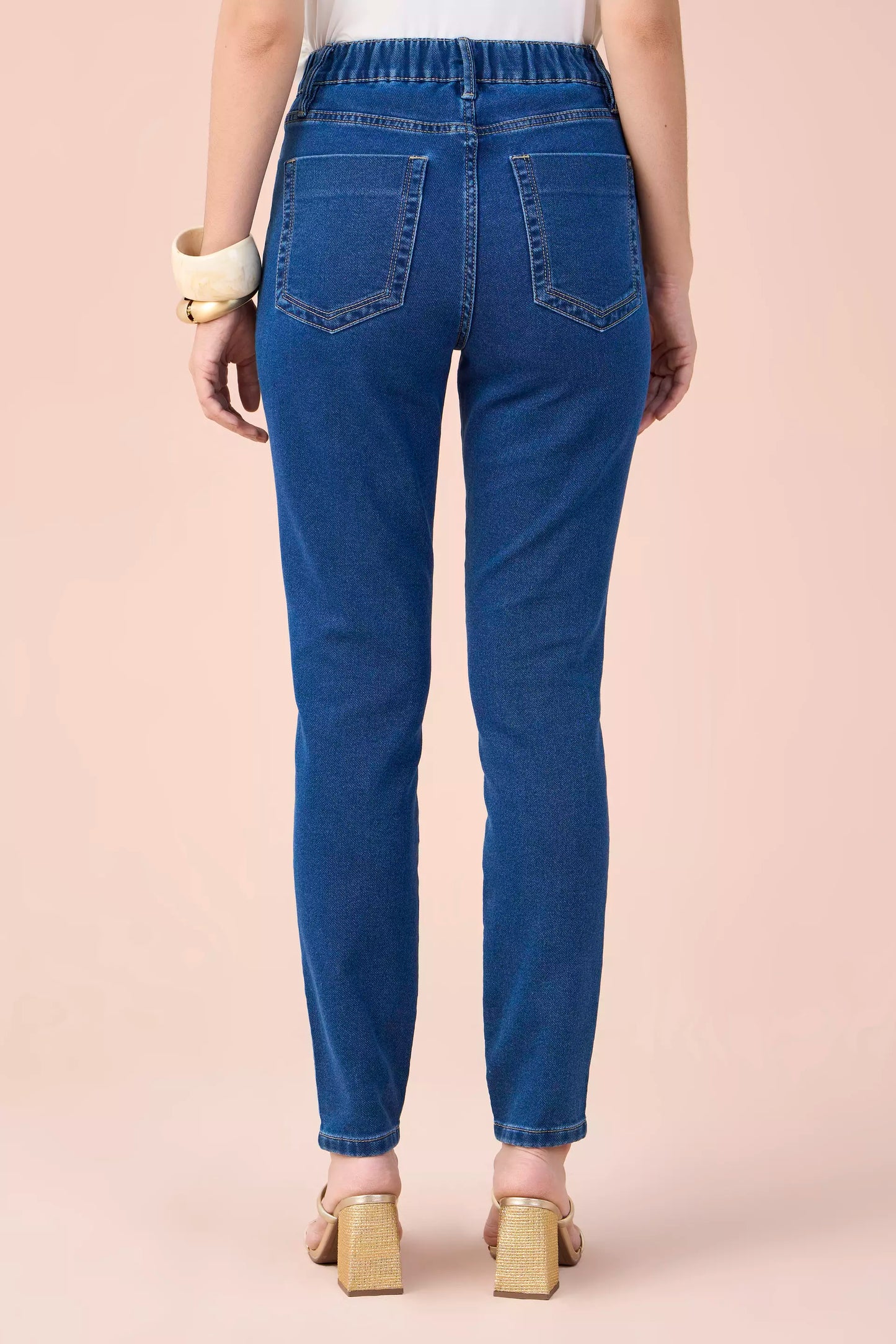 calça jeans malha skinny cintura intermedíaria com elástico
