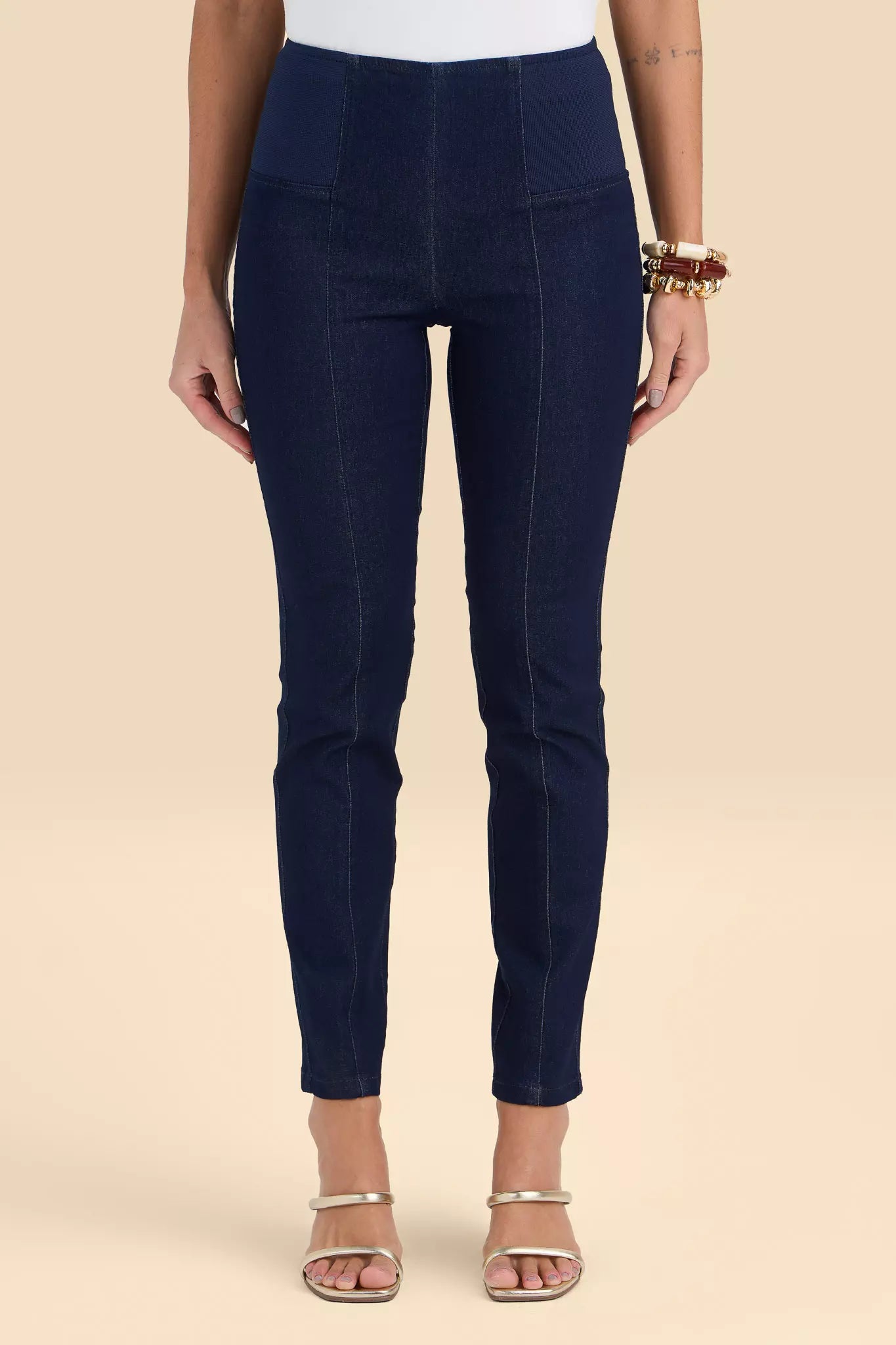 calça jeans skinny cintura intermedíaria cós de tricot largo