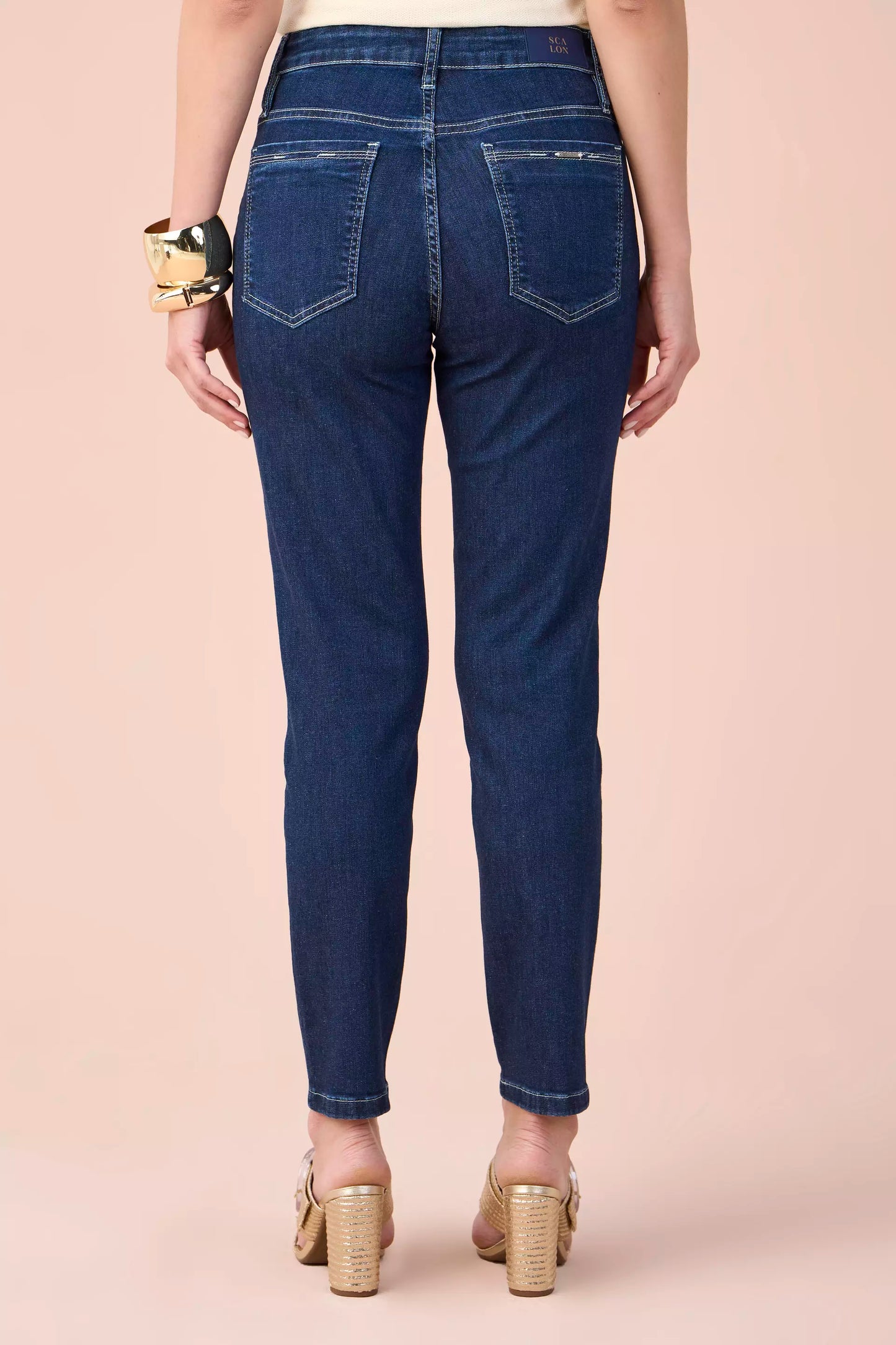 calça jeans skinny cintura intermedíaria pesponto interrompido