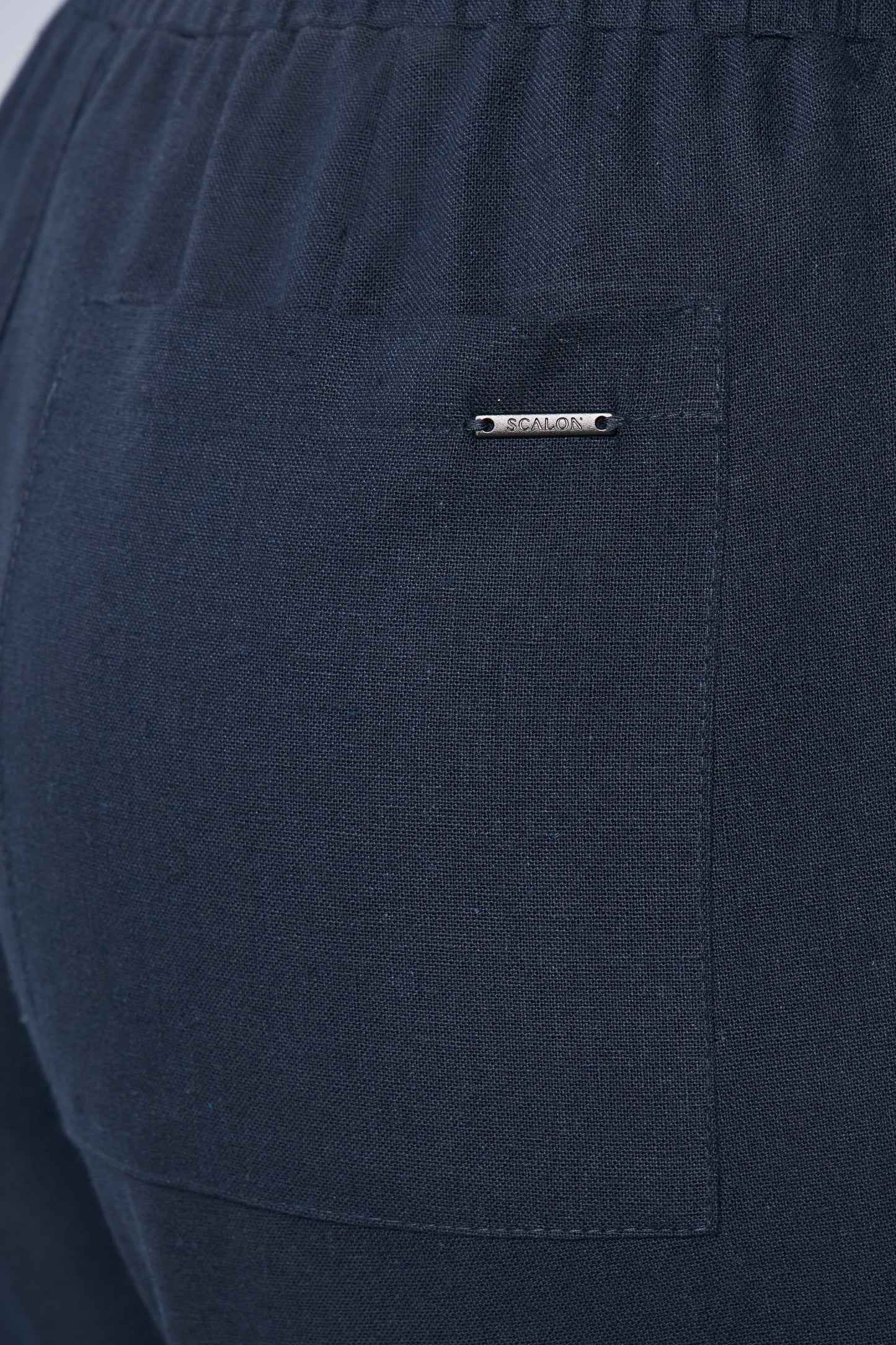 calça linho jogger cintura intermediária com bolsos sobrepostos