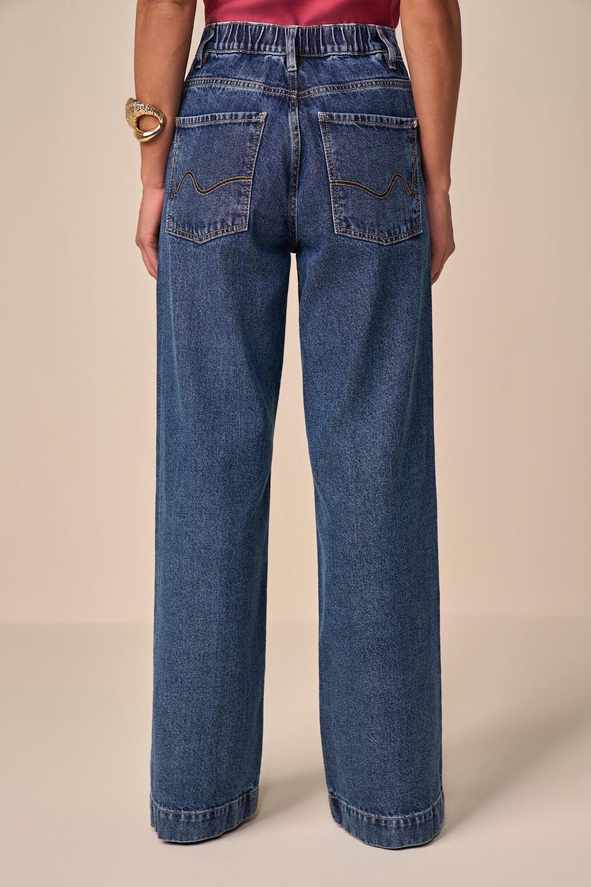 calça jeans wide leg cintura intermediária cós de elástico