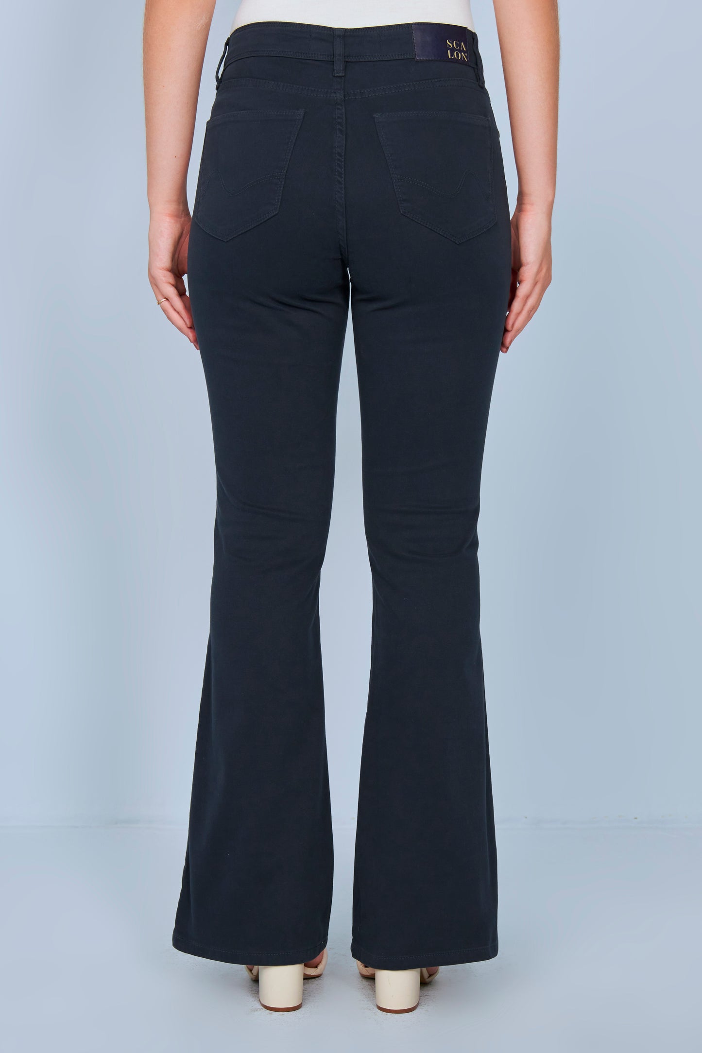 calça malha color boot cut cintura intermediária