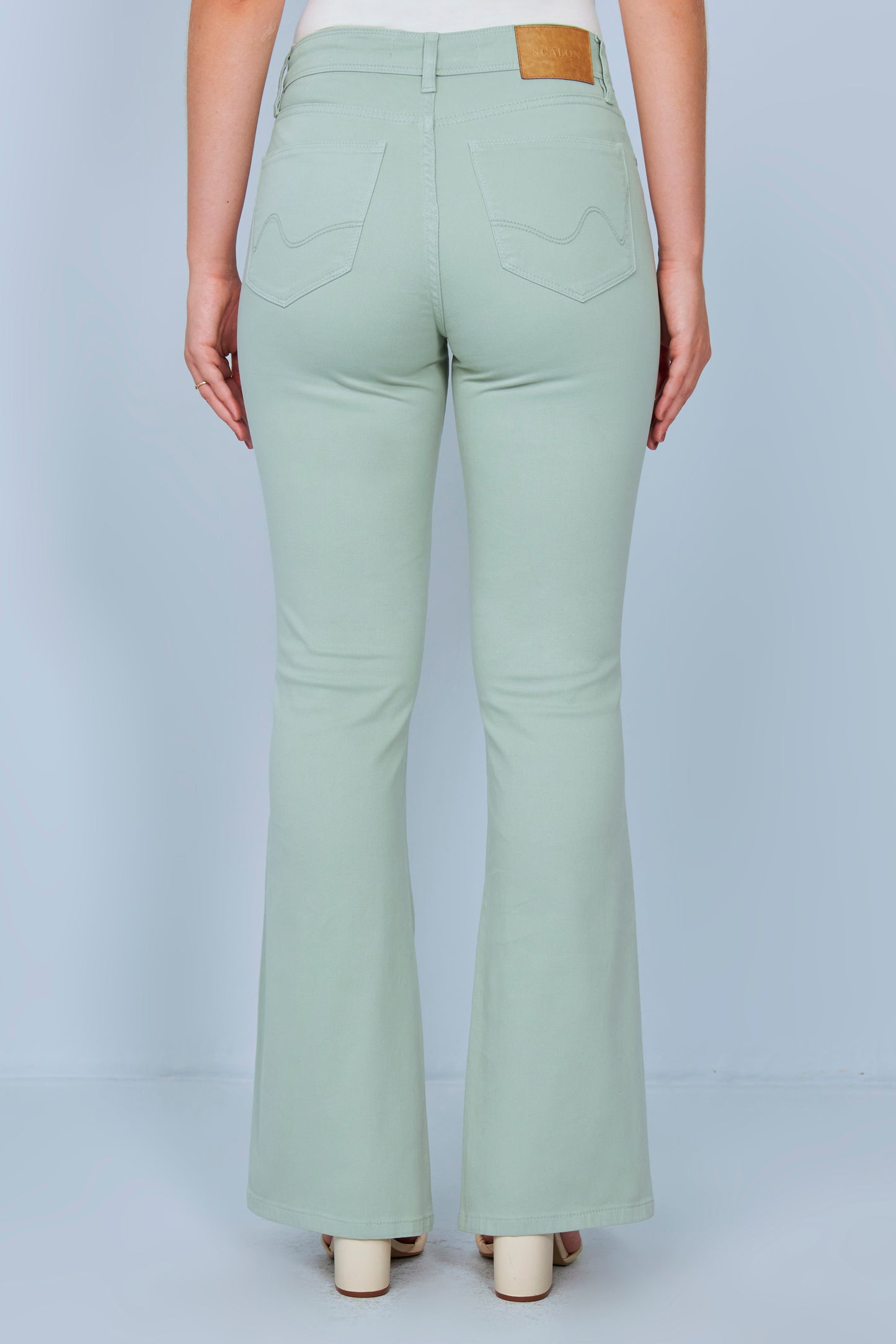 calça malha color boot cut cintura intermediária
