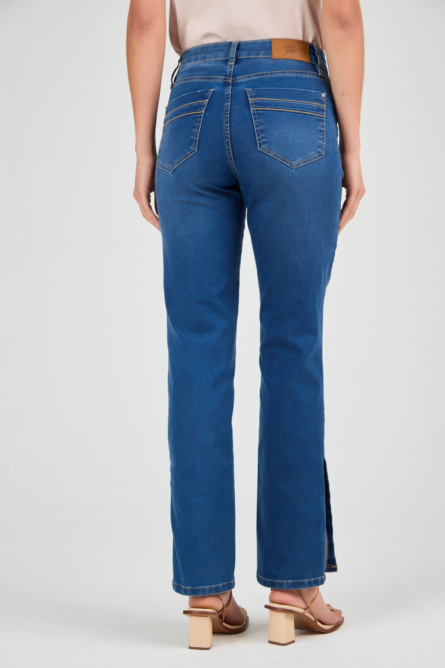 cala jeans reta cintura intermediria com abertura