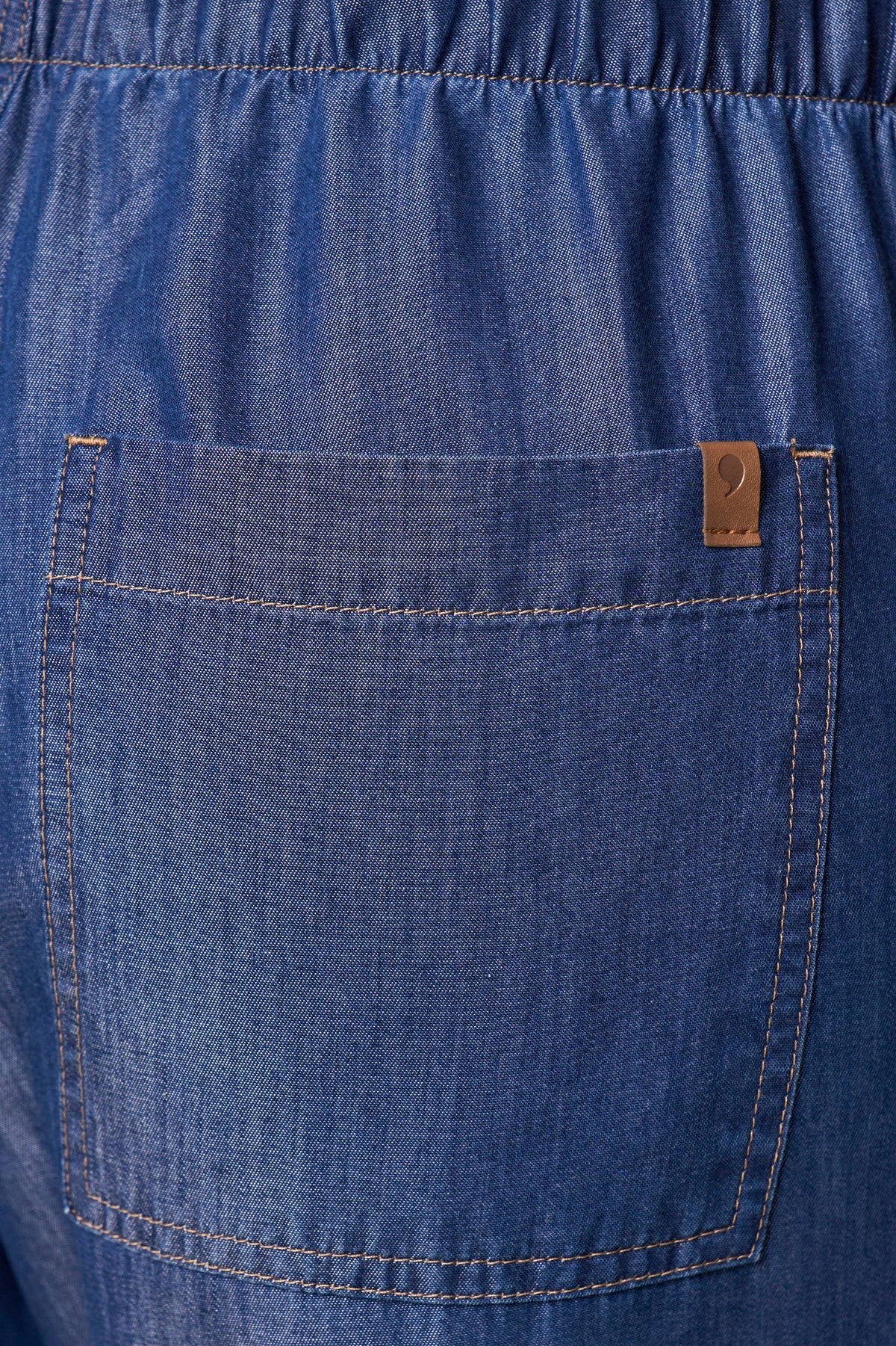 calça jeans reta cintura intermediária cós de elástico