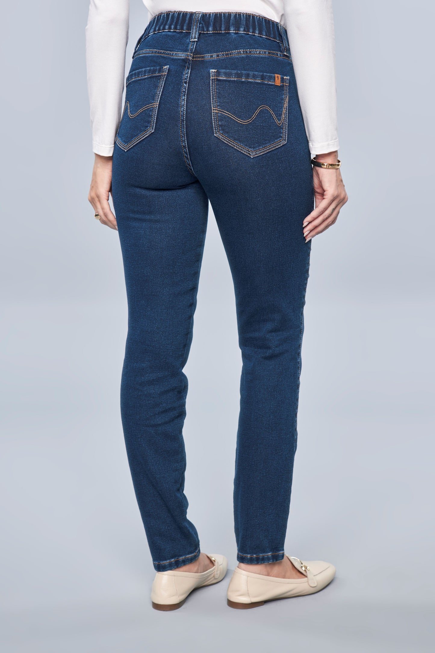 calça jeans malha skinny cintura intermediária com elástico