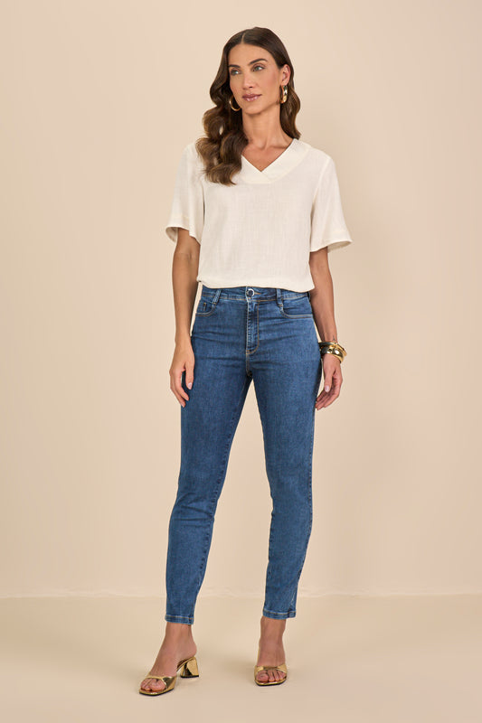 calça jeans skinny cintura intermediária com ponto corrente